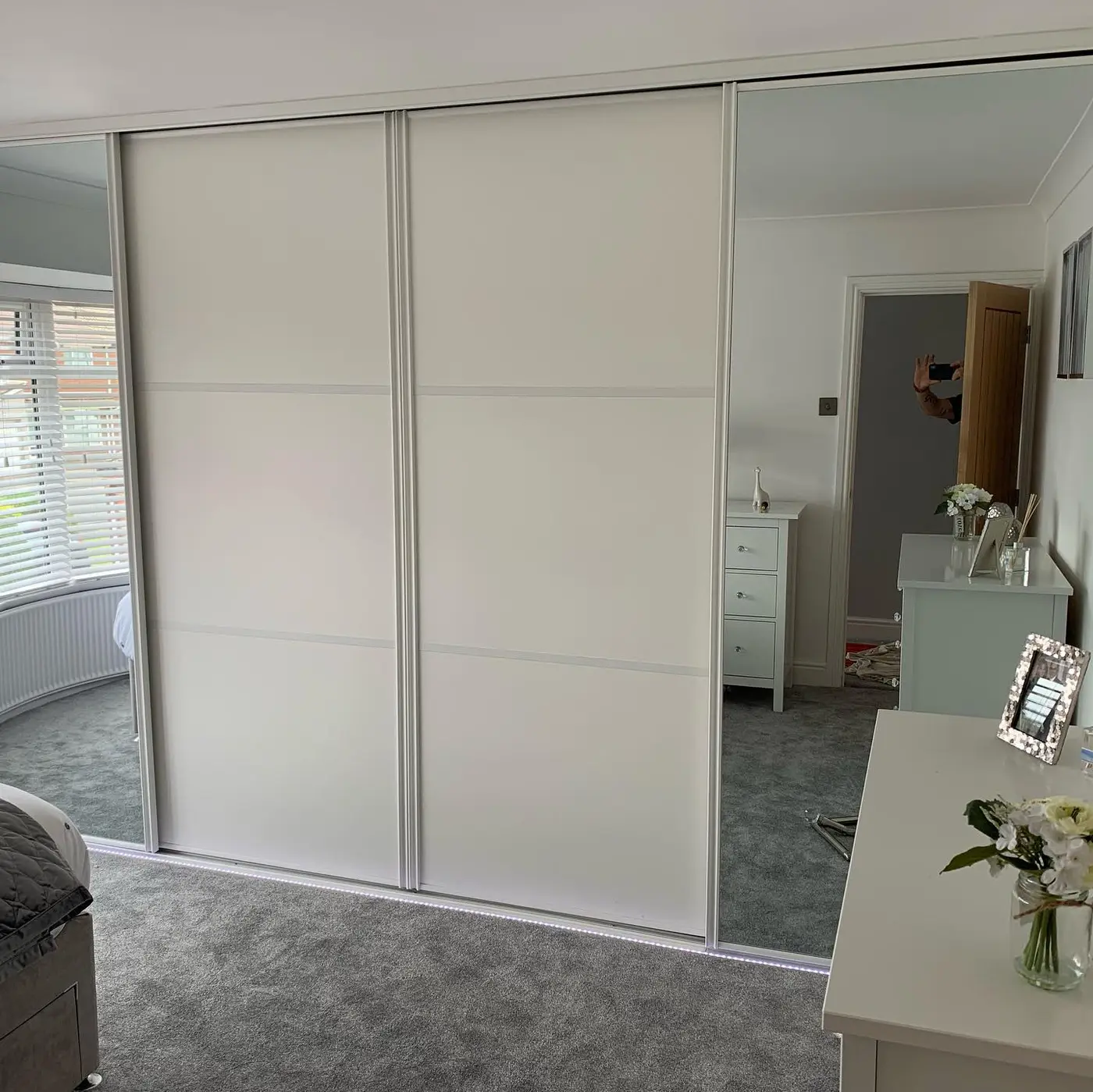 Newly built in slide robes with mirrored doors